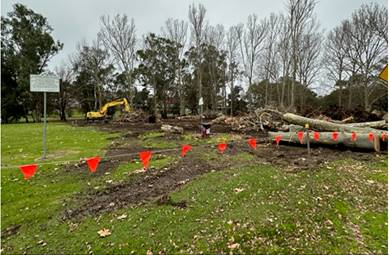 A construction site with orange flags

Description automatically generated with low confidence