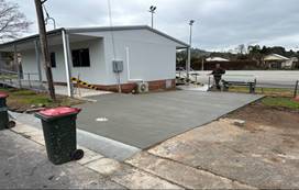 A picture containing outdoor, sky, waste container, tree

Description automatically generated